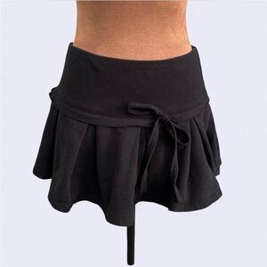 Big Flirt black low rise mini skirt w adjustable bow